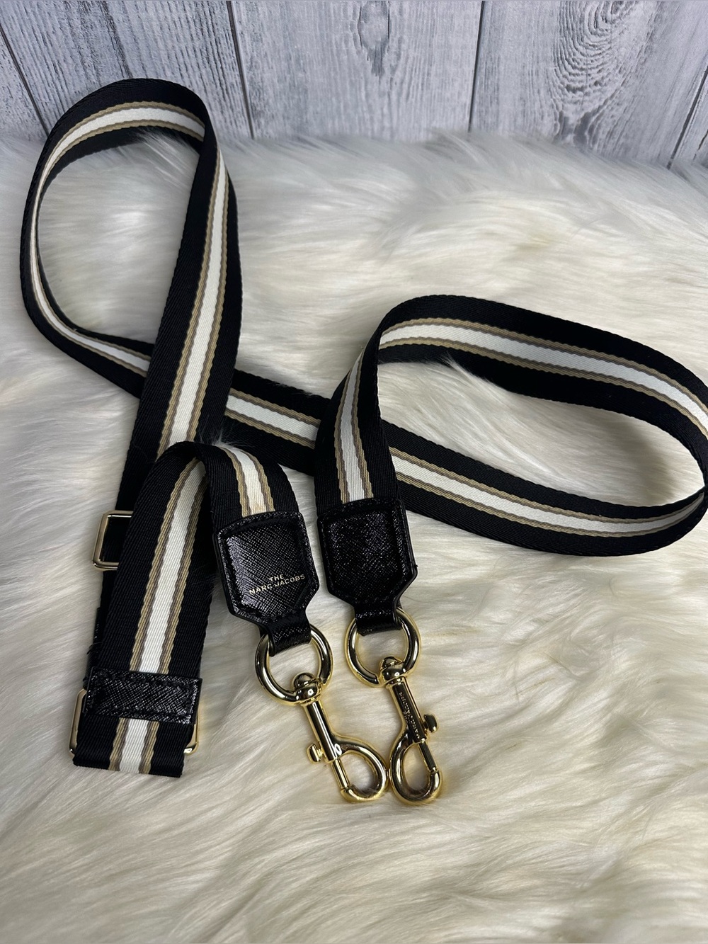 The Marc Jacobs Black Patent Leather Strap with Gold Hardware